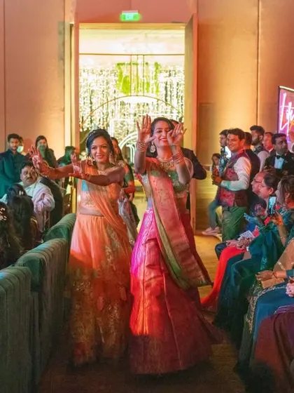 The start of a surprise flashmob entry. We choreograph routines that begin right in the audience, building excitement as the dancers make their way to the stage.