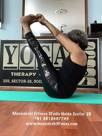 Another demonstration of the classic boat pose, a key posture for building a strong and stable core.