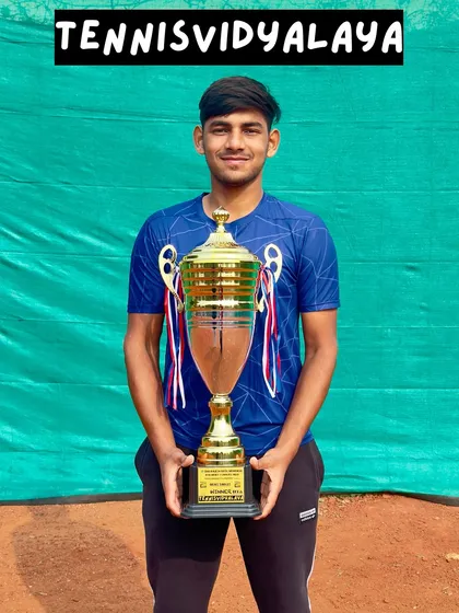 Our champion Mayank Sharma with his winner's trophy from the Rajesh Patel Memorial AITA Men's Tournament.