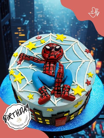 Spider-Man strikes a pose on this dynamic cake, set against a city skyline. The web details and star accents make this a visually exciting cake for any young hero's party.