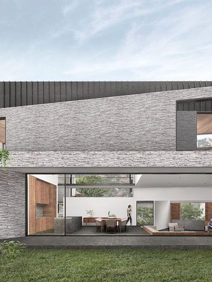 A rendering for our Nandi Hills house, which will be built using load-bearing walls made from waste granite off-cuts. The design features a dynamic, angular roofline and large openings to the garden.