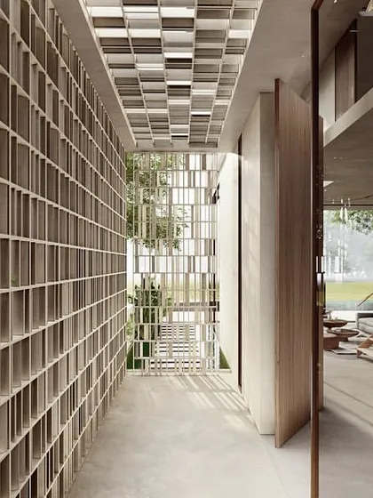 The kitchen in Apartment 56 is a sleek, minimalist space with integrated appliances and a large island. The design emphasizes clean lines and functionality, while still feeling open and connected to the main living areas.