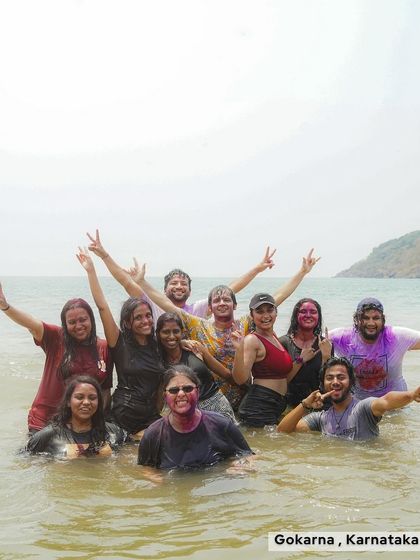 Taking a dip in the ocean at Gokarna after a fun Holi celebration. This is how we combine adventure, community, and festive fun on our trips.