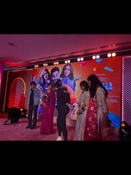 Our stage manager giving cues to the talent on stage during the 'Single Papa' launch. We provide discreet, real-time direction throughout the event.