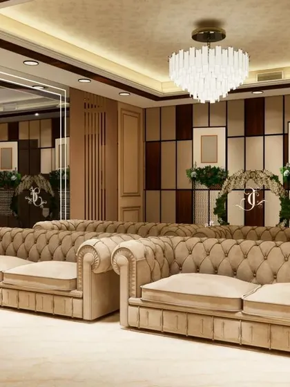 Another perspective of the Gorakhpur banquet hall interior. The design features a mix of classic wood paneling and modern lighting to create a warm, inviting atmosphere perfect for large gatherings.