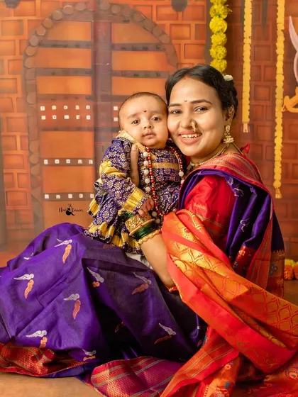 The bond between a mother and child, wrapped in tradition. A beautiful portrait from our Shiv Jayanti themed shoot, showcasing traditional Marathi attire.