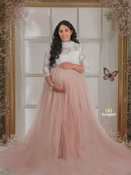 A delicate and romantic setup with a baby's breath floral frame. The soft pink and white color palette creates a gentle and feminine portrait.