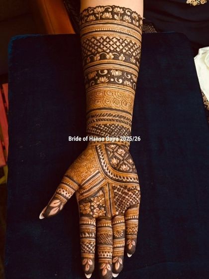 A close-up of a back-of-hand design, showcasing the clean lines and intricate details of the floral and jaali patterns. Every stroke is placed with precision.