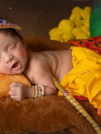 A tiny yawn from a sleepy Kanha. It's these real, authentic moments that make each newborn session so unique and special.