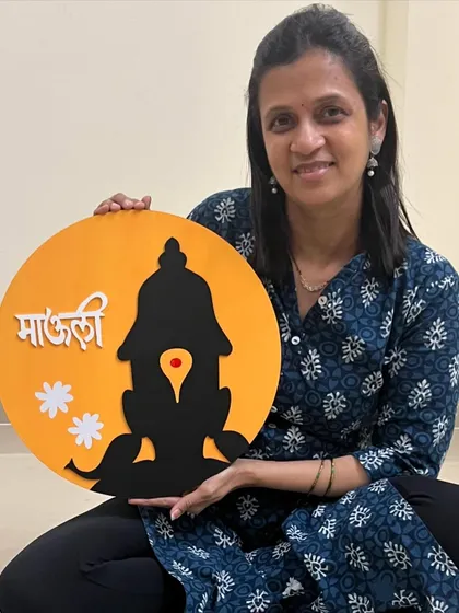 This 'Mauli' wall piece, featuring the silhouette of Lord Vitthal, was part of a custom set sent to the UK. The vibrant yellow and black design is both traditional and modern.
