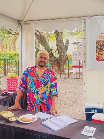 Ankur at our stall at Maya Bazaar, surrounded by the vibrant energy of the event. We love participating in community gatherings.