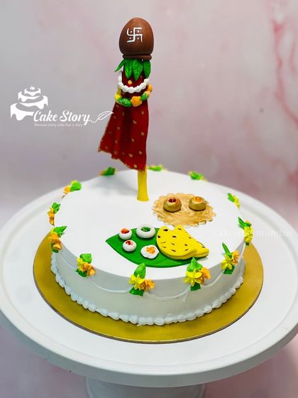 A cake to celebrate Gudhi Padwa, the Maharashtrian New Year. It features a fondant Gudhi, along with other traditional elements, to welcome the new year with sweetness.