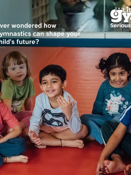 A group of preschoolers sits attentively in a circle, listening to their instructor. This is where we build 'Citizen Kid' skills like listening, taking turns, and respecting others.