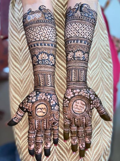 A creative design featuring the couple's names combined into a single logo on one palm, and a personal quote on the other, making it truly unique.