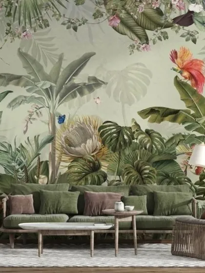 This living room is transformed into a lush paradise with a wallpaper featuring a variety of green tropical plants and colorful flowers.