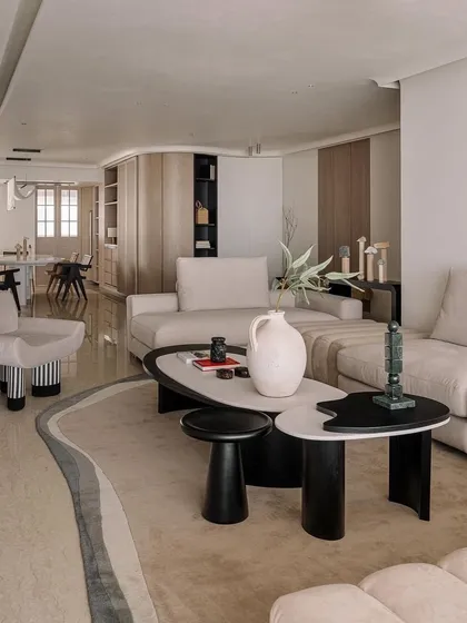 This view of the Kanso House living room shows how our pieces create a sense of calm and quiet luxury. The neutral sofas, sculptural coffee tables, and curated totems come together to form a space that is both simple and deeply personal.