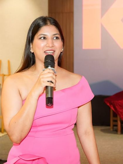 A candid shot from the Kress Dealers Meet, where I am interacting with the audience to create a lively and conversational atmosphere.