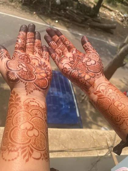 The beautiful stain on my bestie's hands. The heart-filled floral design has developed into a lovely, warm color.