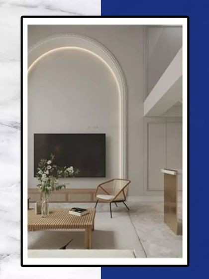 This design showcases a minimalist approach to luxury. An arched wall feature with integrated lighting serves as a sophisticated backdrop for a modern entertainment unit.