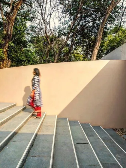 Our designs foster moments of spontaneous interaction and repose. Here, the sunken courtyard of the Kasturbhai Lalbhai Museum in Ahmedabad becomes an informal amphitheater, where the interplay of light, shadow, and landscape creates a dynamic social space.