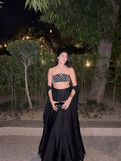 Bling season is here. A modern ethnic look featuring a stunning crystal chain top paired with a simple black skirt.