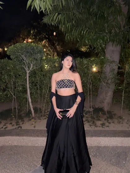 Bling season is here. A modern ethnic look featuring a stunning crystal chain top paired with a simple black skirt.