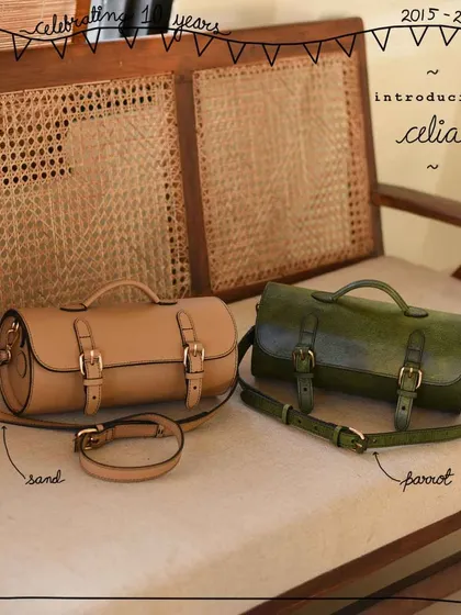 Introducing the Celia, our vintage-inspired cylindrical sling, shown here in solid Sand and hand-colored Parrot leather.