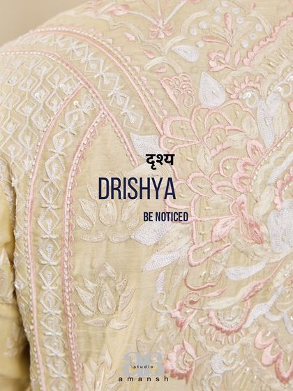 A detail shot of the embroidery on the shoulder of the yellow kurta, with our brand motto.