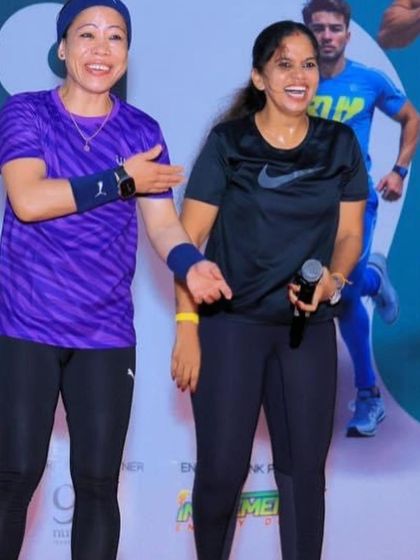 Sharing a laugh on stage with Mary Kom. Her energy and spirit were a highlight of the UKG Unity Run.