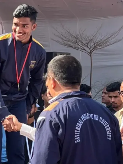 A handshake of respect and victory. My athlete Gagan Amin on the podium after the 4x400m relay win at the State Inter University meet.