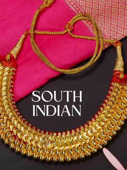 We also offer a beautiful collection of traditional South Indian jewellery. This classic gold-finish necklace is perfect for brides wanting an authentic temple jewellery look for their wedding ceremonies.
