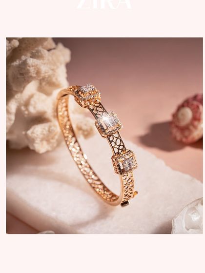 A stylish Italian bracelet featuring square diamond motifs on a textured rose gold band.