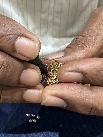 Here you can see the delicate process of setting small diamonds into a gold piece. This is where trust in craftsmanship is built. Our commitment to superior quality means your custom jewellery is not just beautiful, but also resilient enough for you to wear and enjoy for years to come.