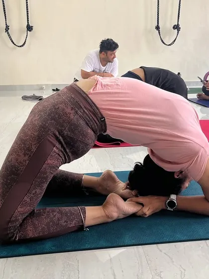 Students practicing Kapotasana in our Ghatkopar studio. You can see the different levels of flexibility, and everyone is working within their own capacity, which is the essence of our practice.