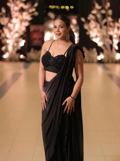 A black saree is timeless elegance. My look for a sophisticated evening event.