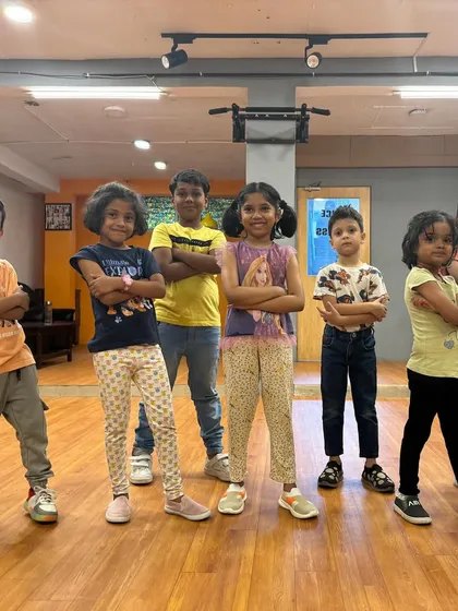 Attitude and fun go hand in hand here. A group of our youngest campers showing off their cool poses and building confidence together after class.
