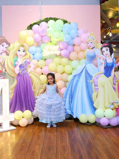 We believe in creating a fairytale backdrop that feels like stepping into another world. This full-scale Disney Princess setup features life-sized cutouts of multiple princesses and a lush balloon wall, making it the perfect photo spot for the birthday royalty.