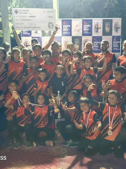 The entire team celebrates a big victory, holding up their medals and trophies. These are the moments of shared joy that fuel our passion for the sport.