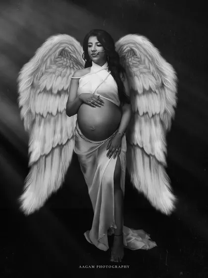 The black and white version of the ethereal angel wings portrait. It gives the image a more dramatic and timeless quality.