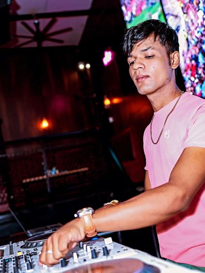 Lost in the music, with the colorful LED screen creating a beautiful backdrop.