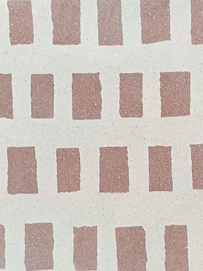 The same unshakable pattern, this time in a soft pink and white combination, offering a warmer, more subtle take on the design.