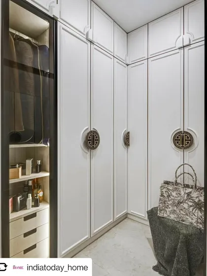 The walk-in wardrobe from our 'Cedar Abode' project, as featured in India Today Home. The custom Chinese-style handles are a standout detail.