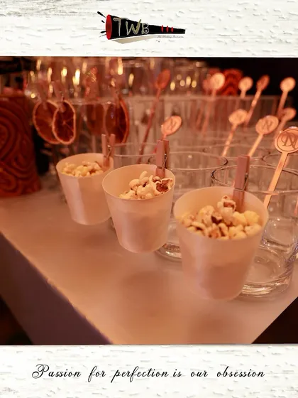 Our signature Buttery Popcorn Sour, garnished with actual popcorn. This playful and inventive cocktail is always a crowd-pleaser, combining sweet, sour, and savory notes.