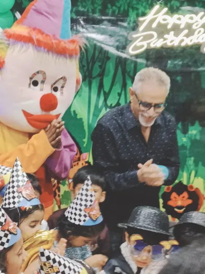 Our Joker mascot interacting with kids and guests during a cake-cutting ceremony at a birthday party in Seawoods.