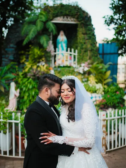 An intimate and emotional portrait of the bride and groom after their Christian wedding ceremony. These are the moments of quiet connection that I strive to capture.