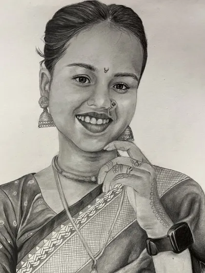 A finished pencil sketch of a smiling woman in a sari. I took care to render the details of her traditional attire, including the intricate henna on her hand.