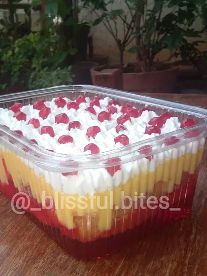 A beautiful shot of my Mixed Fruit Trifle, showcasing the colourful layers and fresh fruit topping. It's a classic dessert that never fails to impress at parties.