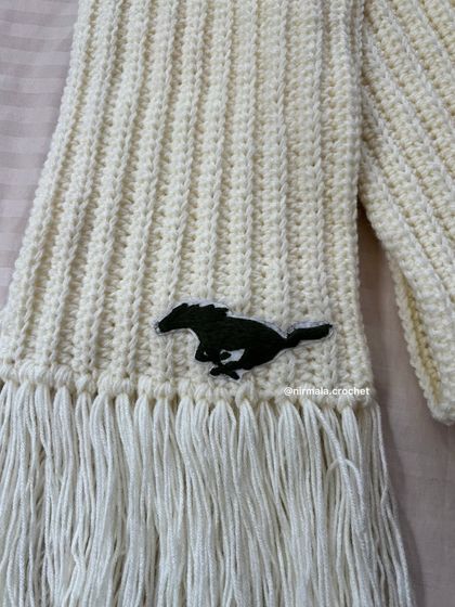 A detailed shot of the Mustang logo embroidery. We can digitize and embroider almost any simple logo or design you have in mind.