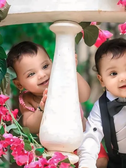 Capturing the playful interaction between siblings is always a joy. This photo from a Raksha Bandhan themed shoot shows two little ones sharing a candid moment, full of smiles and mischief. It’s a perfect snapshot of their budding bond.