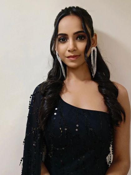 A beautiful portrait of the client, ready for her cocktail event. The makeup is designed to look great both in person and in photos.